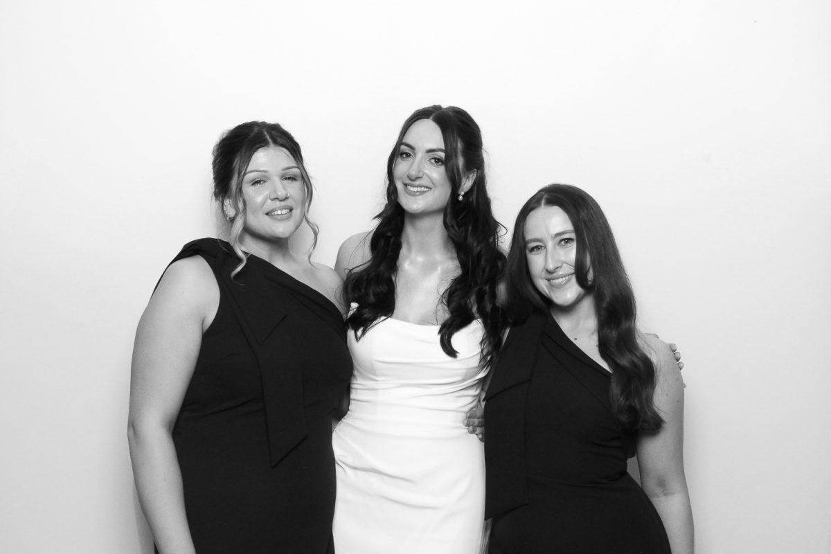 Bride and Bridesmaids posing in black and white Photo Booth hire at Middleton Lodge wedding